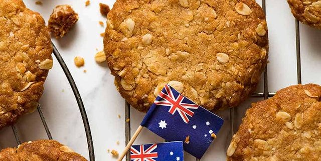 Overhead photo of Anzac biscuits on a cooling rack, fresh out of the oven