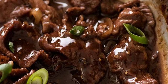 Close up of Chinese Honey Pepper Beef in a skillet, fresh off the stove