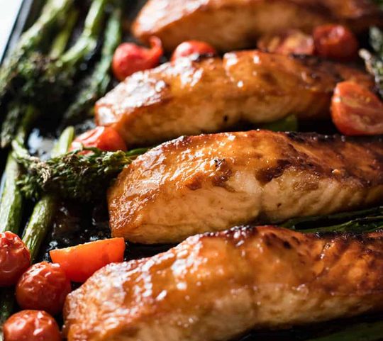 One Sheet Pan Brown Sugar Salmon & Vegetables - The glaze taste incredible and this whole dinner is ready in 15 minutes flat!