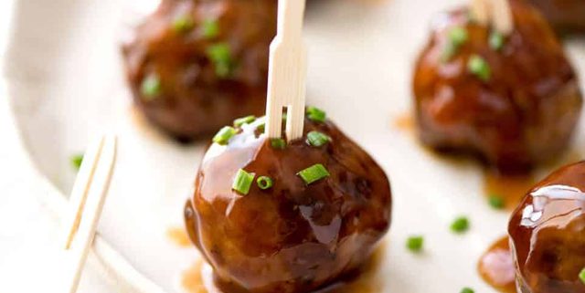 Plump, juicy and soft, these Party Cocktail Meatballs are baked and served with a fabulous Sweet & Sour Dipping Sauce that's super quick to make. Great make ahead for parties! recipetineats.com
