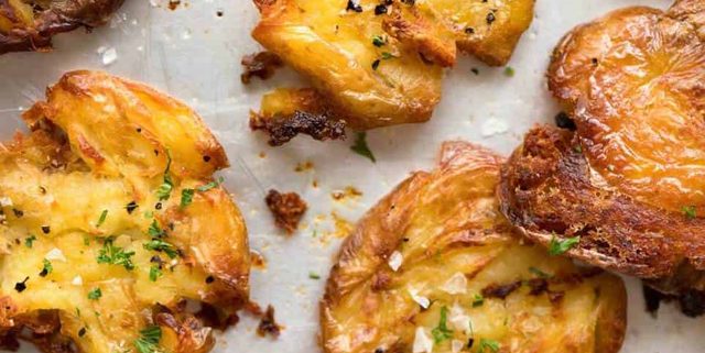 The best, buttery, golden, ultra crispy smashed potatoes you will ever have! recipetineats.com