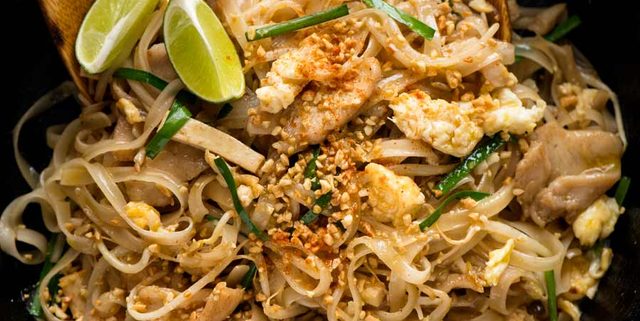 Chicken Pad Thai in a black skillet, fresh off the stove, ready to be served.