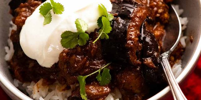 Bowl of Indian eggplant curry on rice
