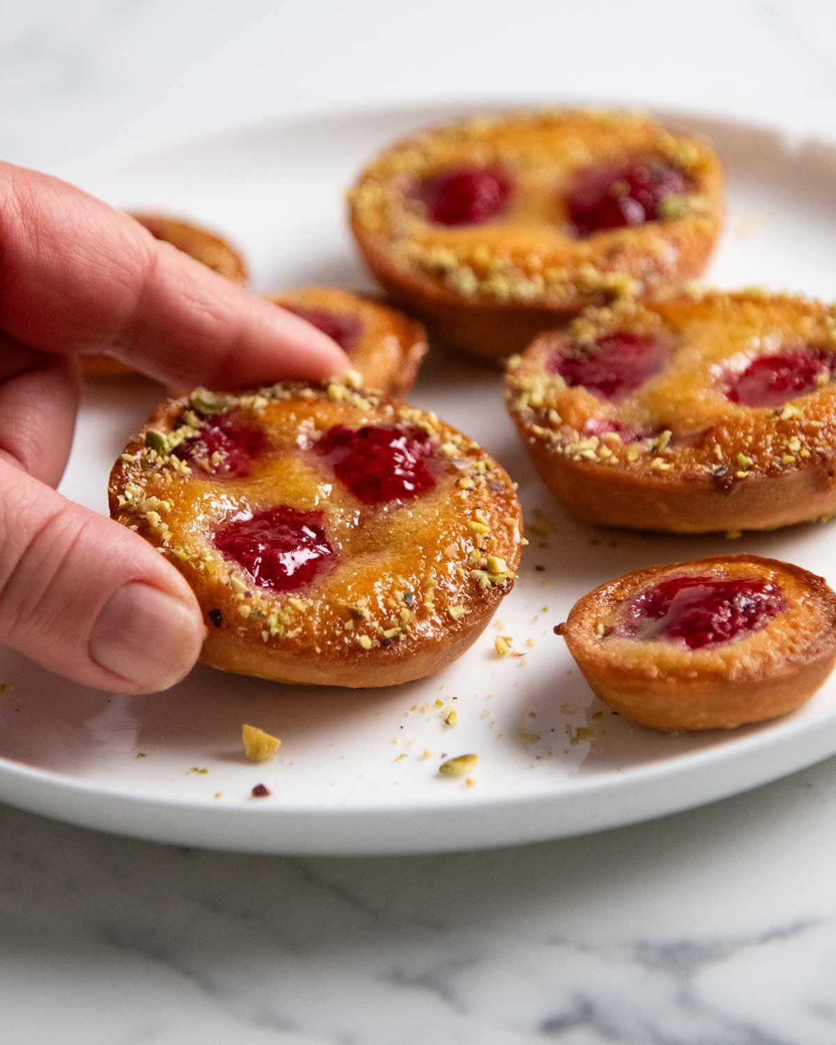 Mini raspberry tarts made in a muffin tin