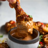 Satay chicken legs with peanut sauce