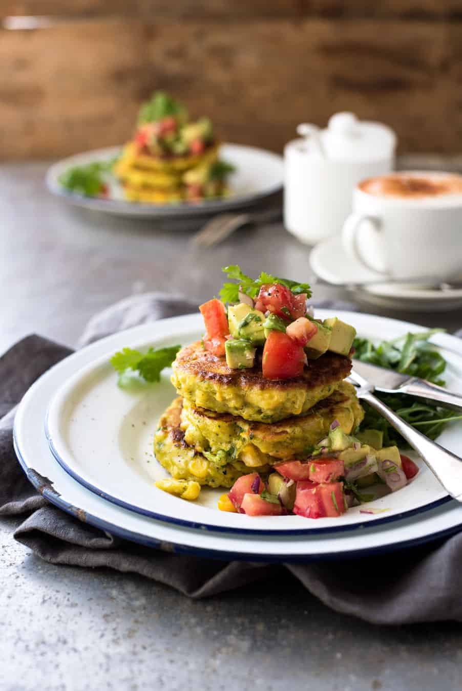 A stack of Bill Granger's Corn Fritters with Avocado Salsa