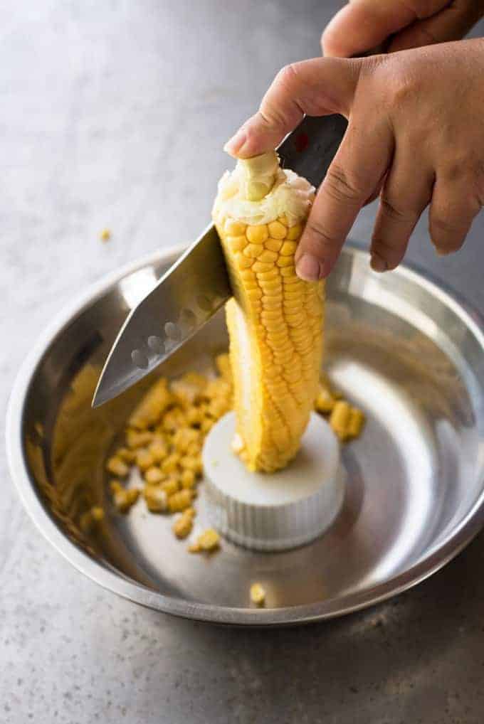 Stripping kernels from corn cob for Corn Fritters