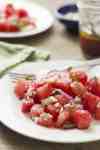 Watermelon Salad - as strange as it sounds, sweet, juicy watermelon with feta, red onion and mint is a winning combination. This summery, light salad is refreshing and is perfect for a summer barbeque.