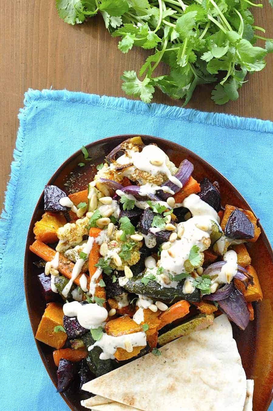 Middle Eastern Roasted Vegetables with Tahini Sauce {Vegan} - great way to use up leftover veggies, insanely simple, fabulous sauce!