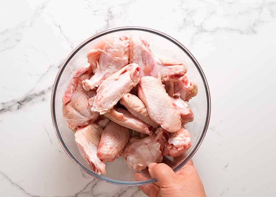 Bowl of raw chicken wings