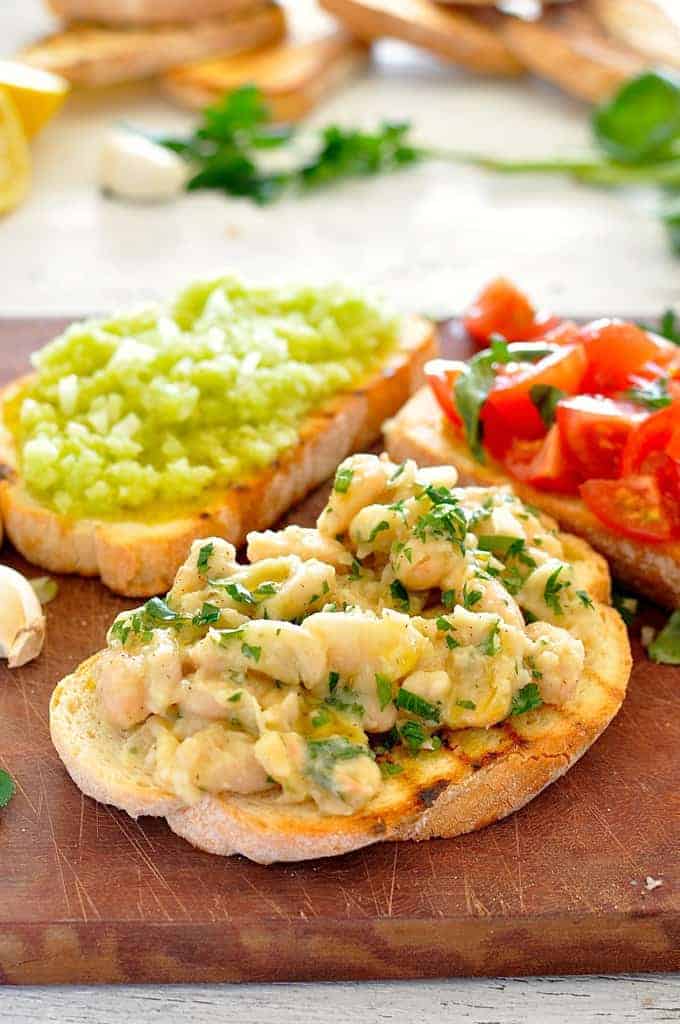 Transform a humble can of cannellini beans into something amazing. One of 3 bruschetta toppings for a Trio of Bruschetta Spread. #Italian #appetizer #starter