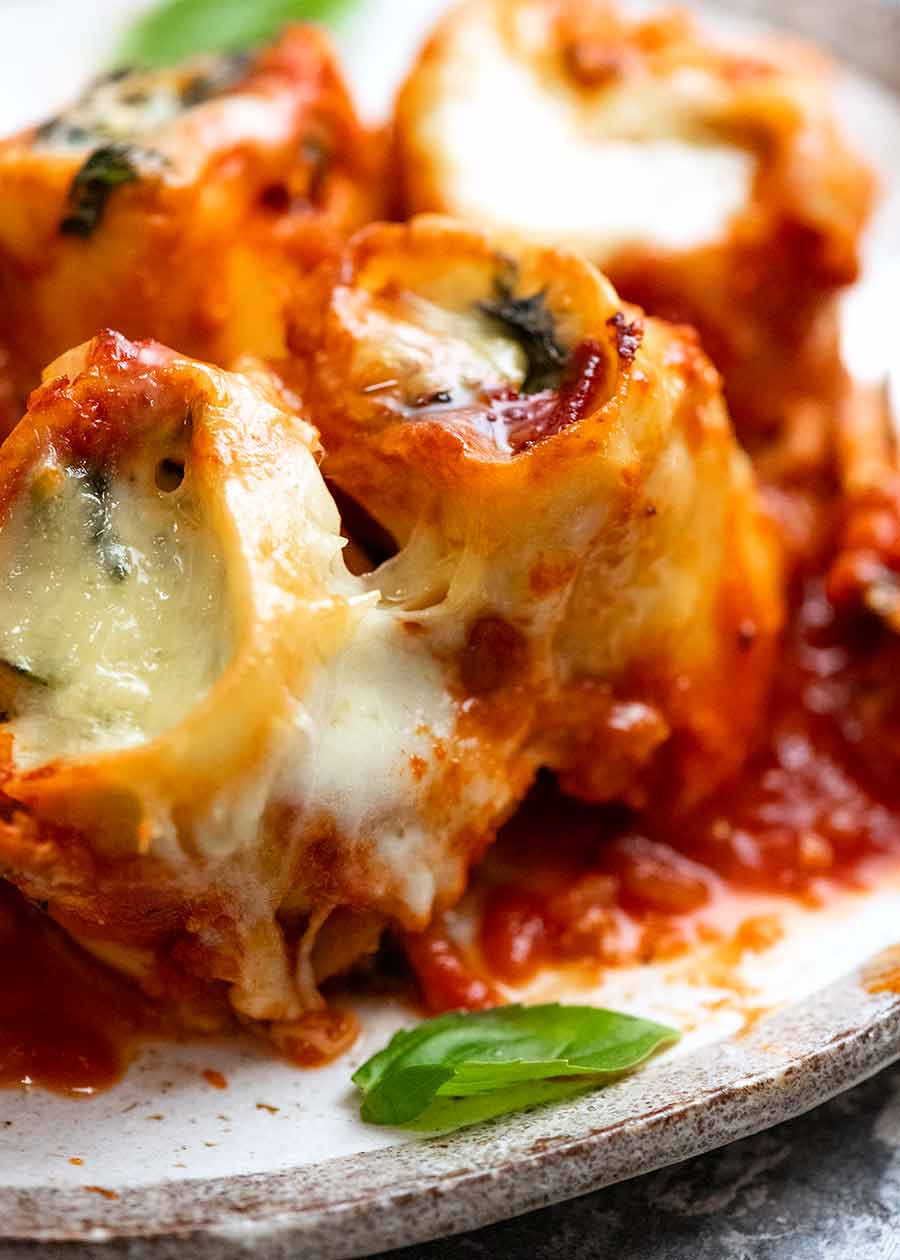 Close up of Spinach and Ricotta Rotolo on a plate, ready to be eaten