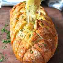 Cheese and garlic crack bread - this cheesy garlic bread is outta this world! www.recipetineats.com