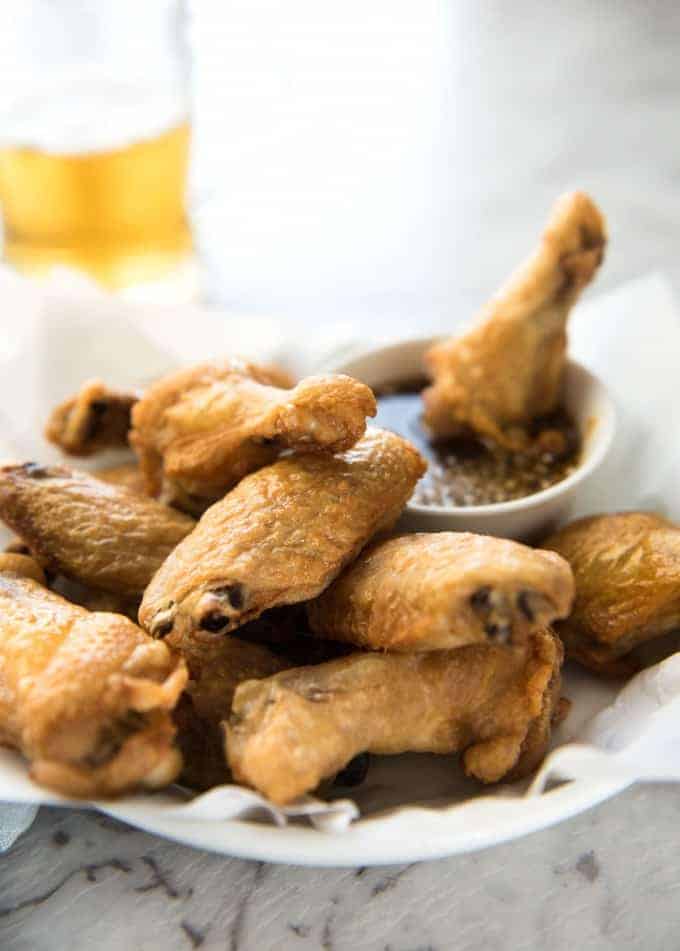 These crispy oven baked wings are so crispy, you will think they've been deep fried! You will be shocked how easy these are to make! recipetineats.com