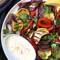 Grilled Vegetables Platter, a simple starter or vegetarian meal, on a white plate ready for serving.