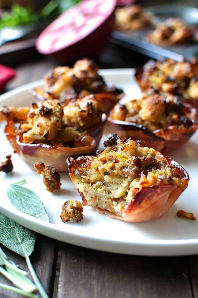 Pork Sausage Apple Stuffing in Pancetta Cups (Muffin Tin) on a white plate.