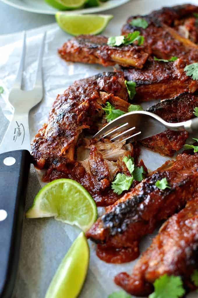 Meat falling off the bone with fork Oven Baked Ribs with Chipotle Barbecue Sauce