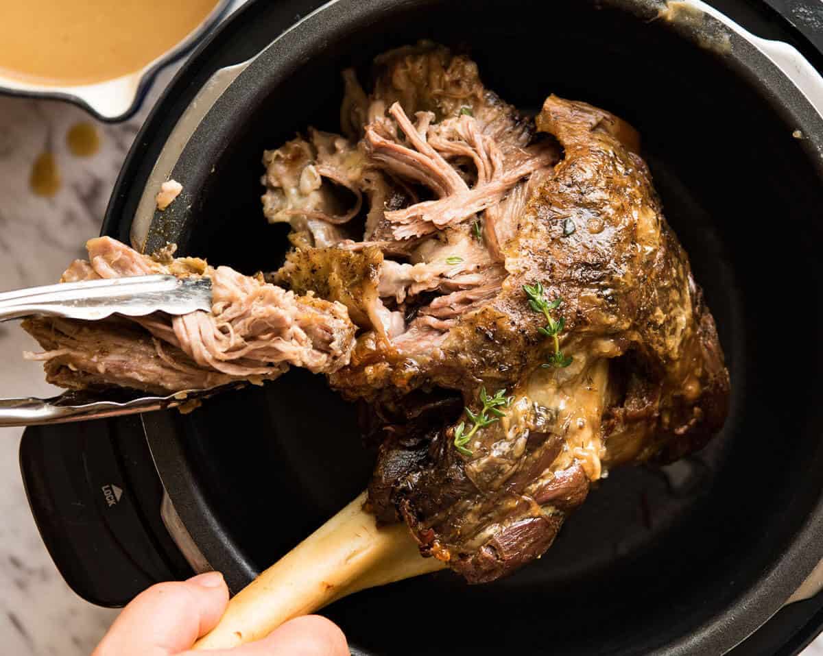 The most succulent and easiest lamb leg ever, this Slow Cooker Roast Lamb Leg takes minutes to prepare. The gravy is incredible! www.recipetineats.com
