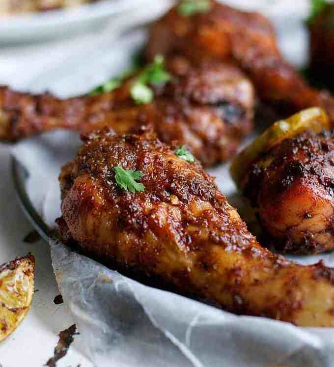 Jamaican Jerk Chicken Drumsticks and Caribbean Rice with Red Beans - the strong, spicy flavours of this chicken is the best from the Caribbean! Easy to make with everyday ingredients.