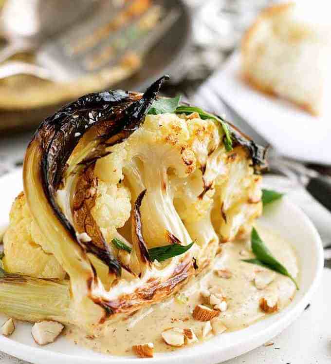Ester's Roasted Cauliflower with Almond Sauce on white plate