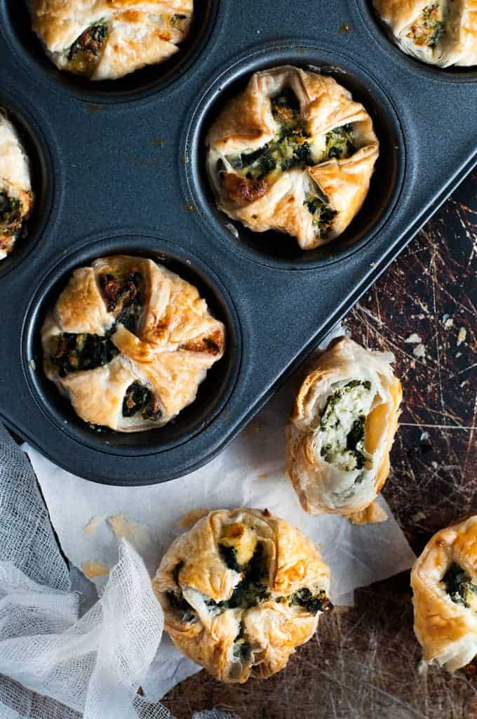Cooked Ricotta and Spinach Puff Pastry Bites in muffin tray