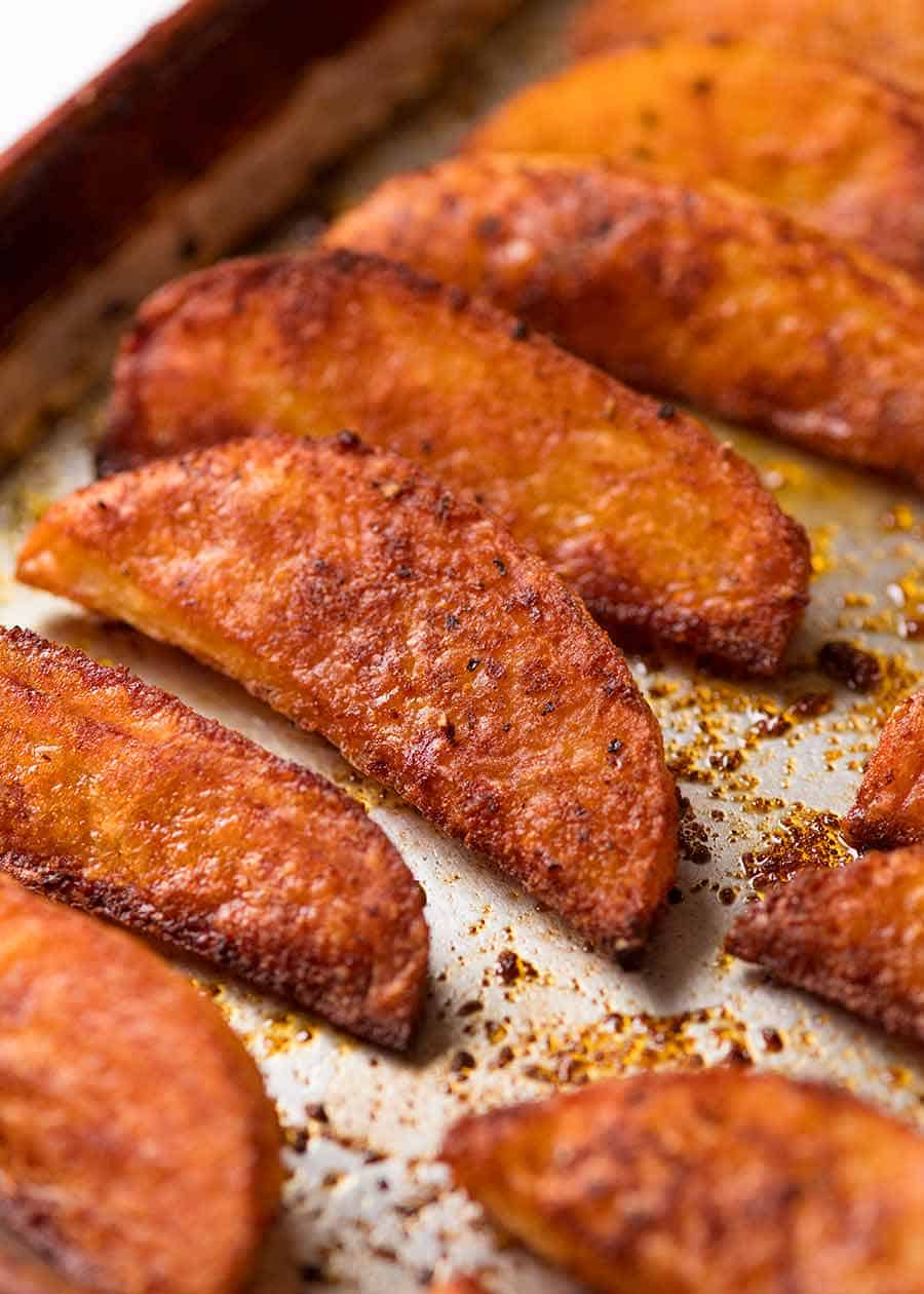 Close up of crunchy baked potato wedges