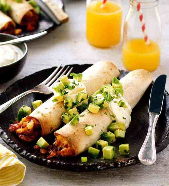 Bacon and Egg Breakfast Enchiladas on a plate