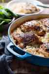 One Pot Creamy Baked Risotto with Lemon Pepper Chicken in a blue pot