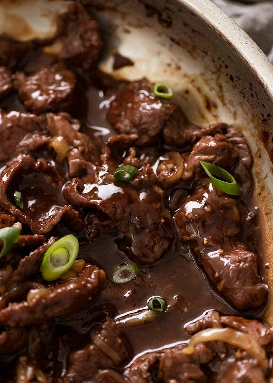 Close up of Chinese Honey Pepper Beef in a skillet, fresh off the stove