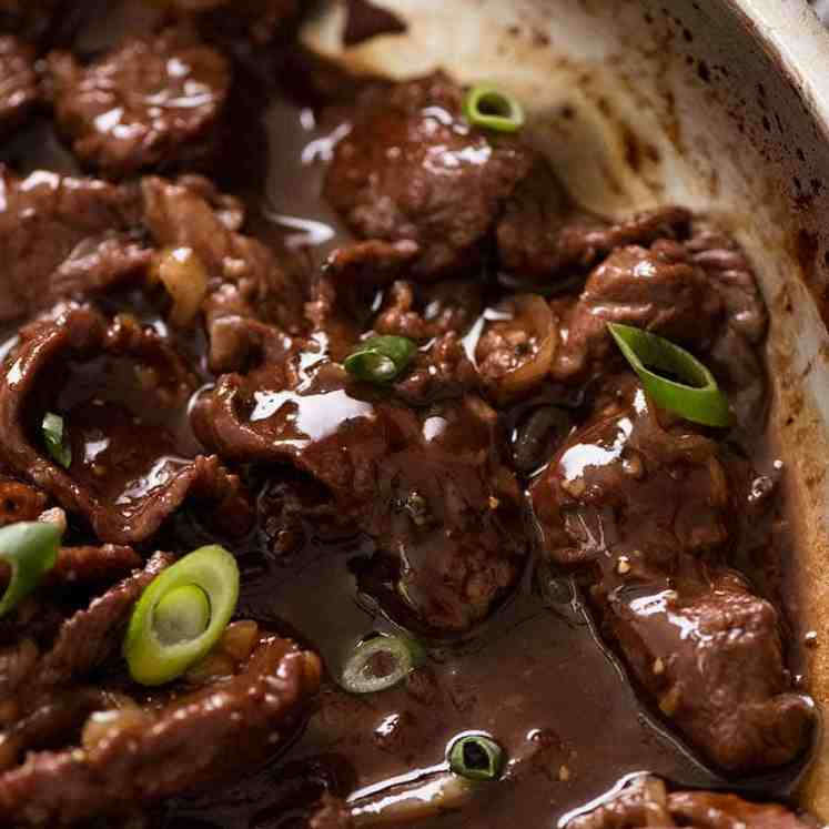 Close up of Chinese Honey Pepper Beef in a skillet, fresh off the stove