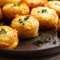 Mini Potato Dauphinoise - Gratin Stacks on a plate