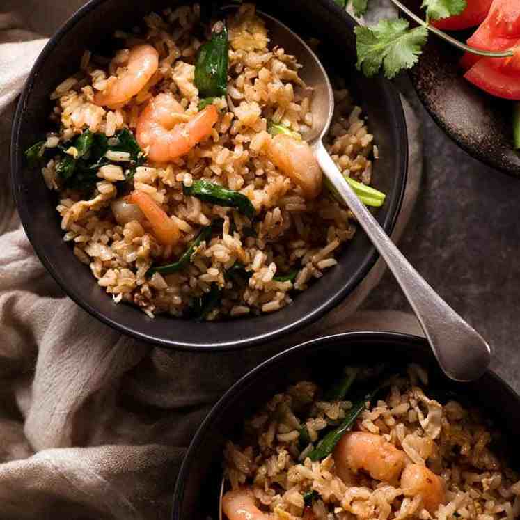 Two bowls of Thai Fried Rice, ready to be eaten