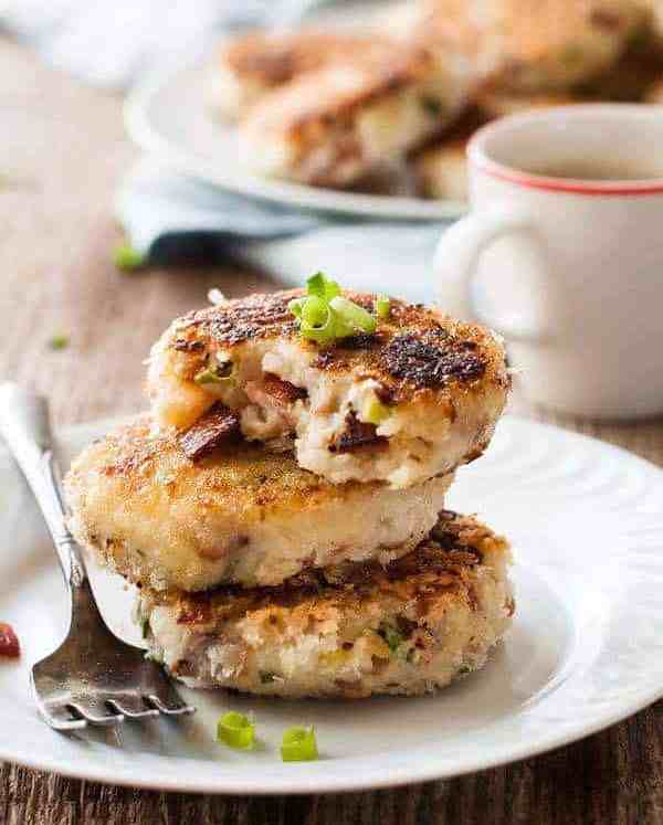 A stack of Mashed Potato Cakes with Cheese & Bacon