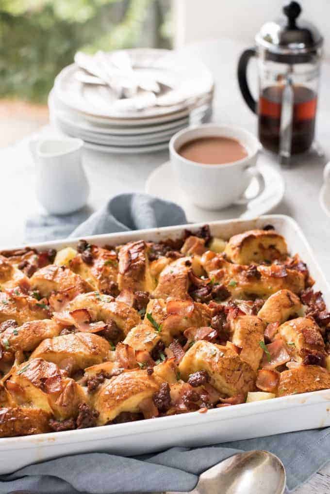 Sausage and Bacon Country Breakfast Casserole in a white dish, ready to be served.