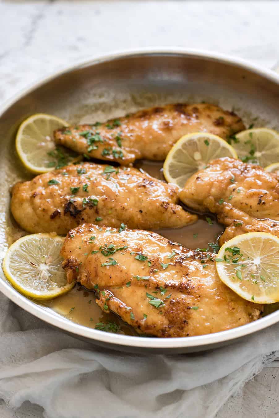 Honey Lemon Chicken - Golden brown chicken breast with a gorgeous honey lemon sauce. On the table in 15 minutes! recipetineats.com