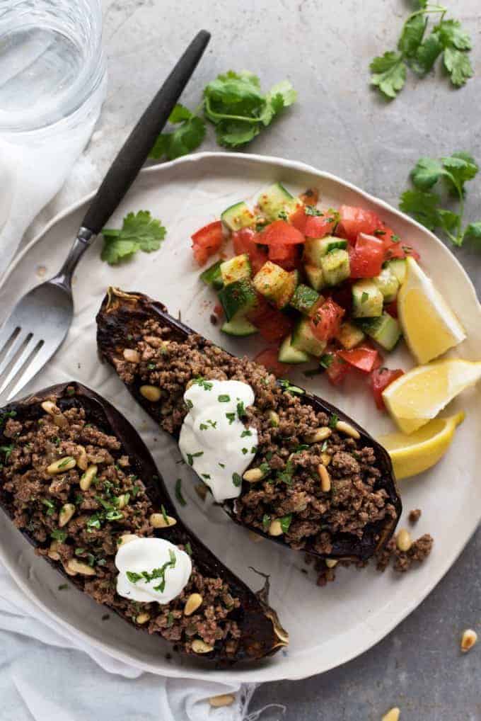 Moroccan Baked Eggplant with Beef with yoghurt topping and cucumber tomato sald