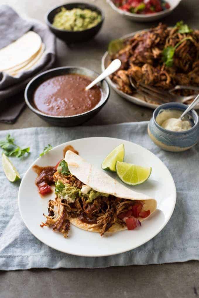 Mexican Shredded Chicken - The smokey, rich, mildly spicy sauce is incredible! Super easy, fast to prepare, for the slow cooker, pressure cooker or stovetop!