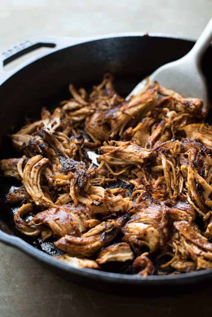 Mexican Shredded Chicken - The smokey, rich, mildly spicy sauce is incredible! Super easy, fast to prepare, for the slow cooker, pressure cooker or stovetop!