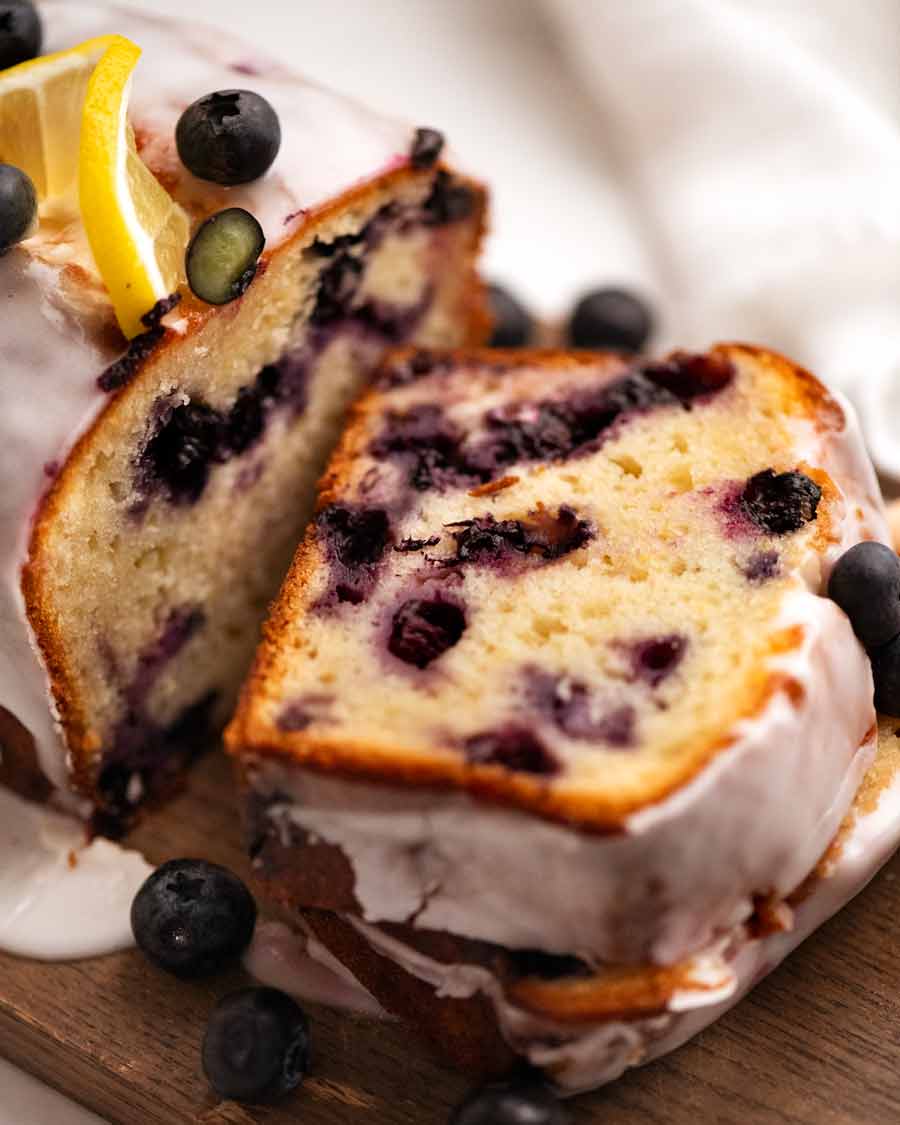 Close up of a slice of Blueberry Lemon Loaf, easy Blueberry cake recipe