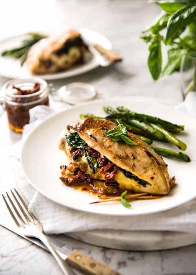 Juicy chicken breast slathered in Italian flavours then stuffed with spinach, sun dried tomato and cheese. 5 minutes prep, no marinating required!