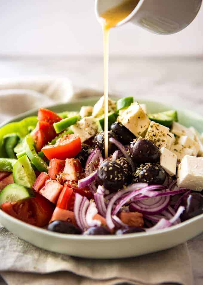 A classic Greek Salad with plump olives and a beautiful homemade Greek Salad Dressing. recipetineats.com