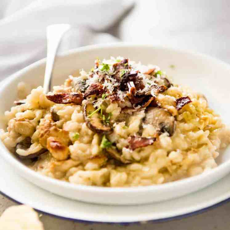 Chicken and Mushroom Risotto - Creamy risotto with golden brown sautéed mushrooms and chicken. Easy, perfectly seasoned and beautifully creamy! recipetineats.com