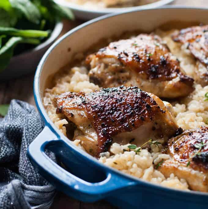 One Pot Creamy Parmesan Garlic Risotto with Lemon Pepper Chicken - fantastic midweek meal, such little effort for an incredible dish. recipetineats.com