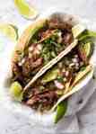 Mexican Pulled Pork Tacos - the juiciest, easiest, most flavoursome Pork Carnitas you will ever make! recipetineats.com