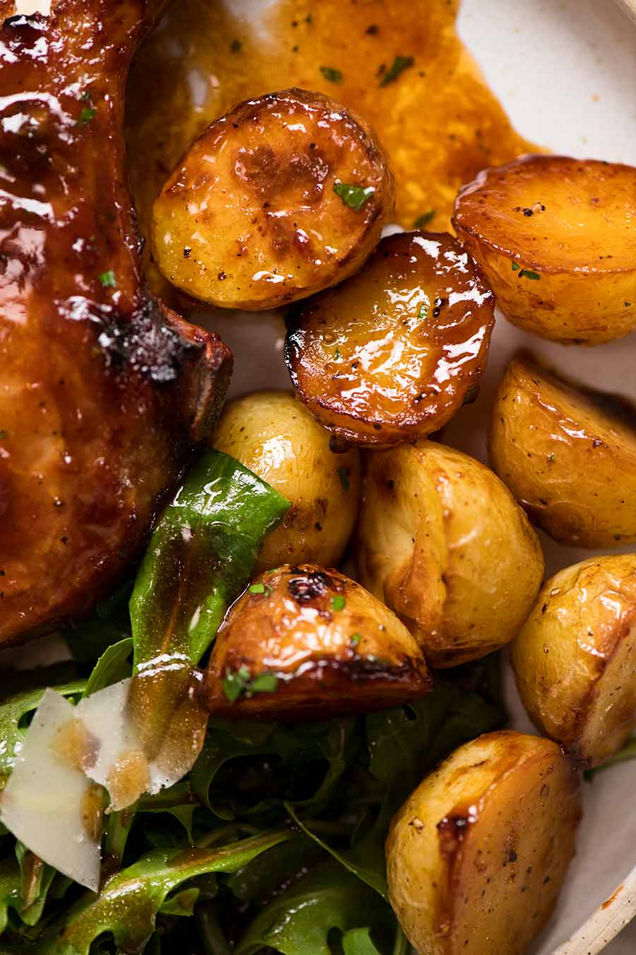 Close-up of baked potatoes with pork chops