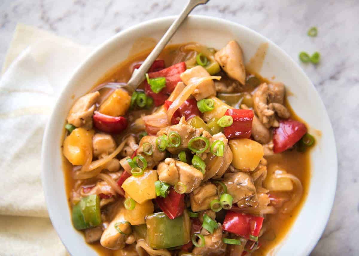 Bright and colourful, this Sweet and Sour Chicken Stir Fry is made with a sauce that rivals the best Chinese restaurants! www.recipetineats.com
