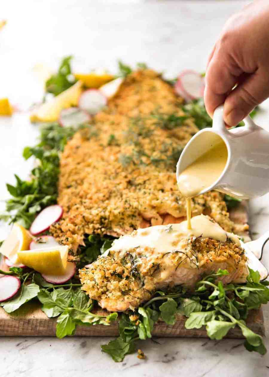 Baked Parmesan Crusted Salmon with Lemon Cream Sauce - easy and fast to make, can be prepared ahead, a stunning centrepiece for Christmas dinner and yet easy enough for midweek. That Lemon Cream sauce is the perfectly finishing tough. recipetineats.com
