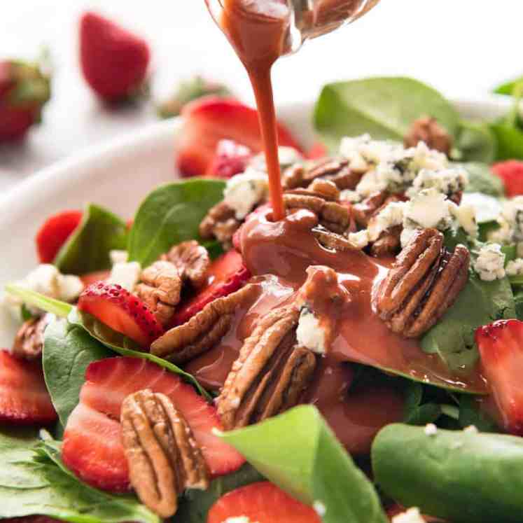 A stunning Chef recipe for a Strawberry Spinach Salad. Spinach, fresh strawberries, blue cheese and candied pecans with a Strawberry Balsamic Dressing. recipetineats.com