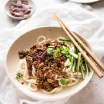 Chinese Pork with Noodles (Zha Jiang Mian) - Super quick and super tasty, affectionally known as "Chinese Bolognese". The pork is savoury with a touch of heat and spice, perfect mixed through noodles! www.recipetineats.com
