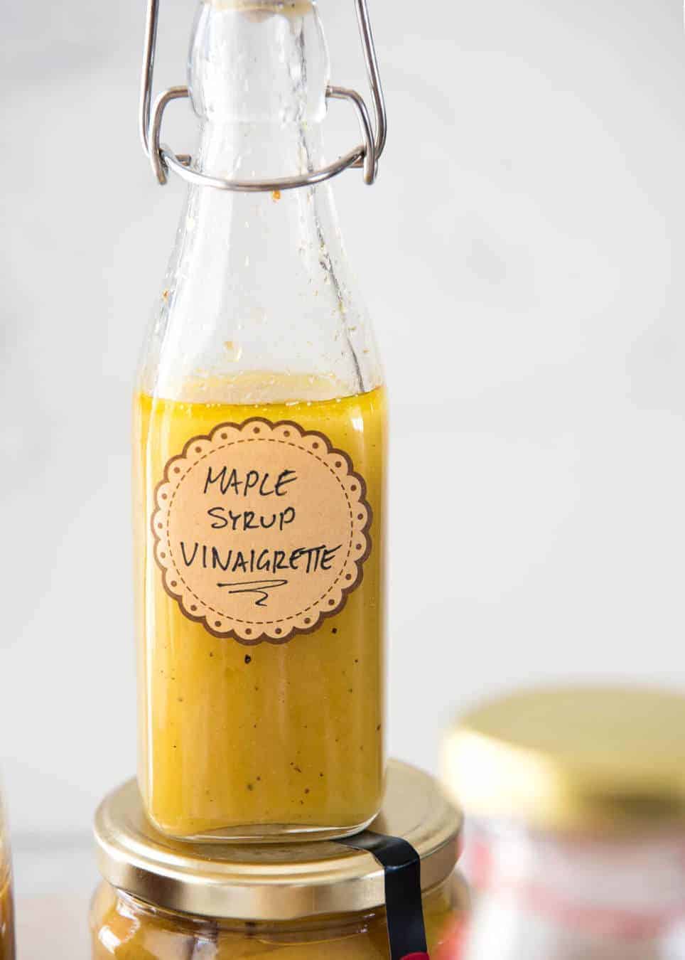 Maple Syrup Dressing made with maple syrup, cider vinegar, olive oil and mustard. Pairs especially well with roasted vegetable salads in a small bottle.
